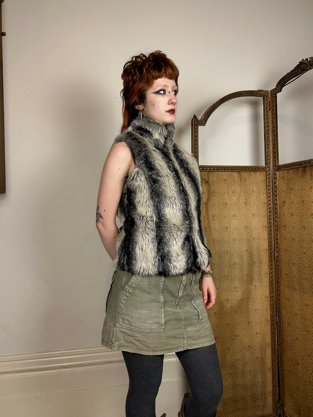 Black and grey furry gilet