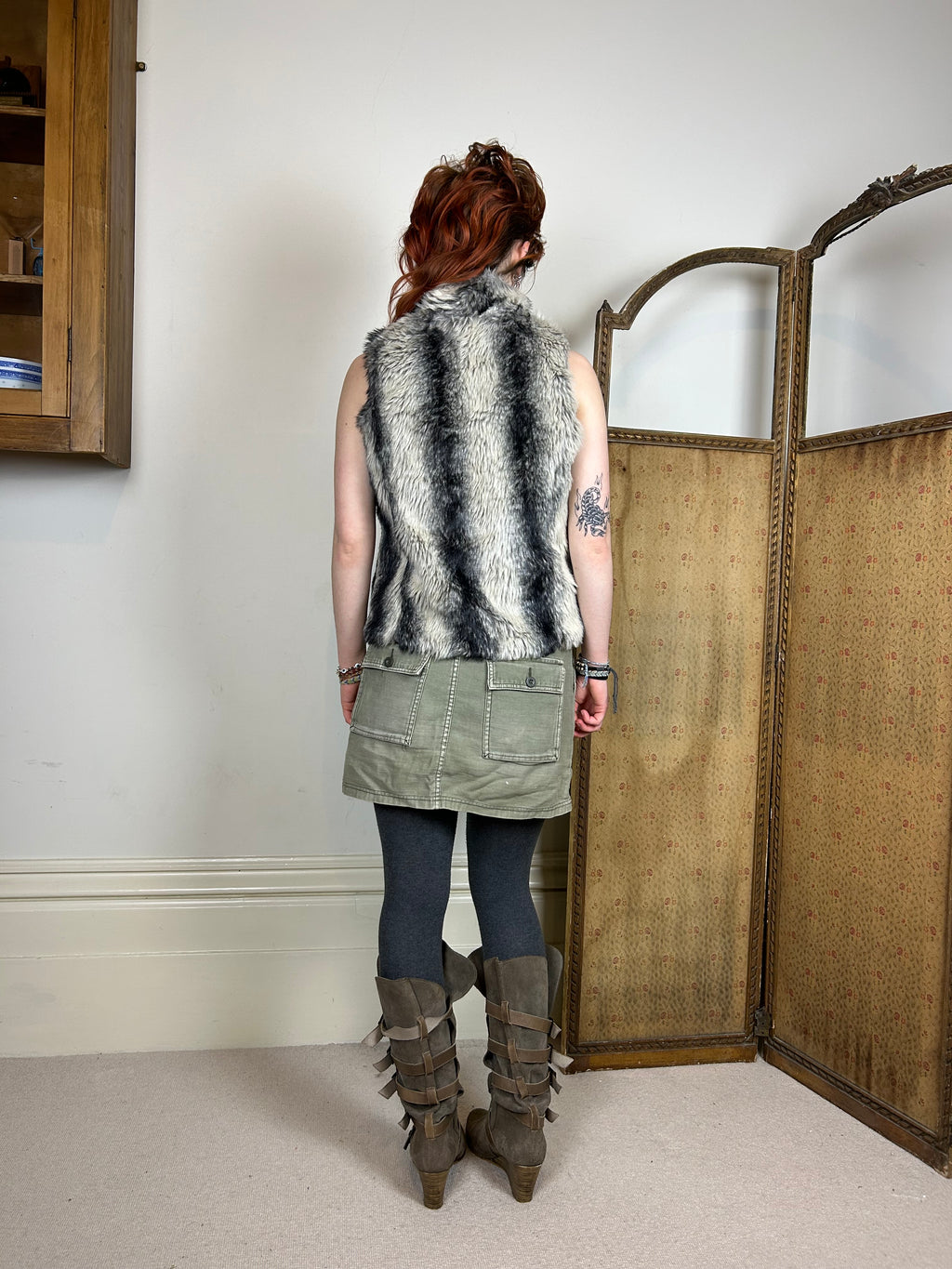 Black and grey furry gilet