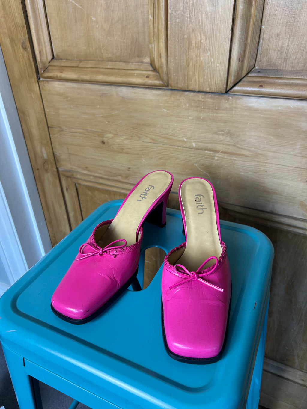 Iconic hot pink FAITH heels