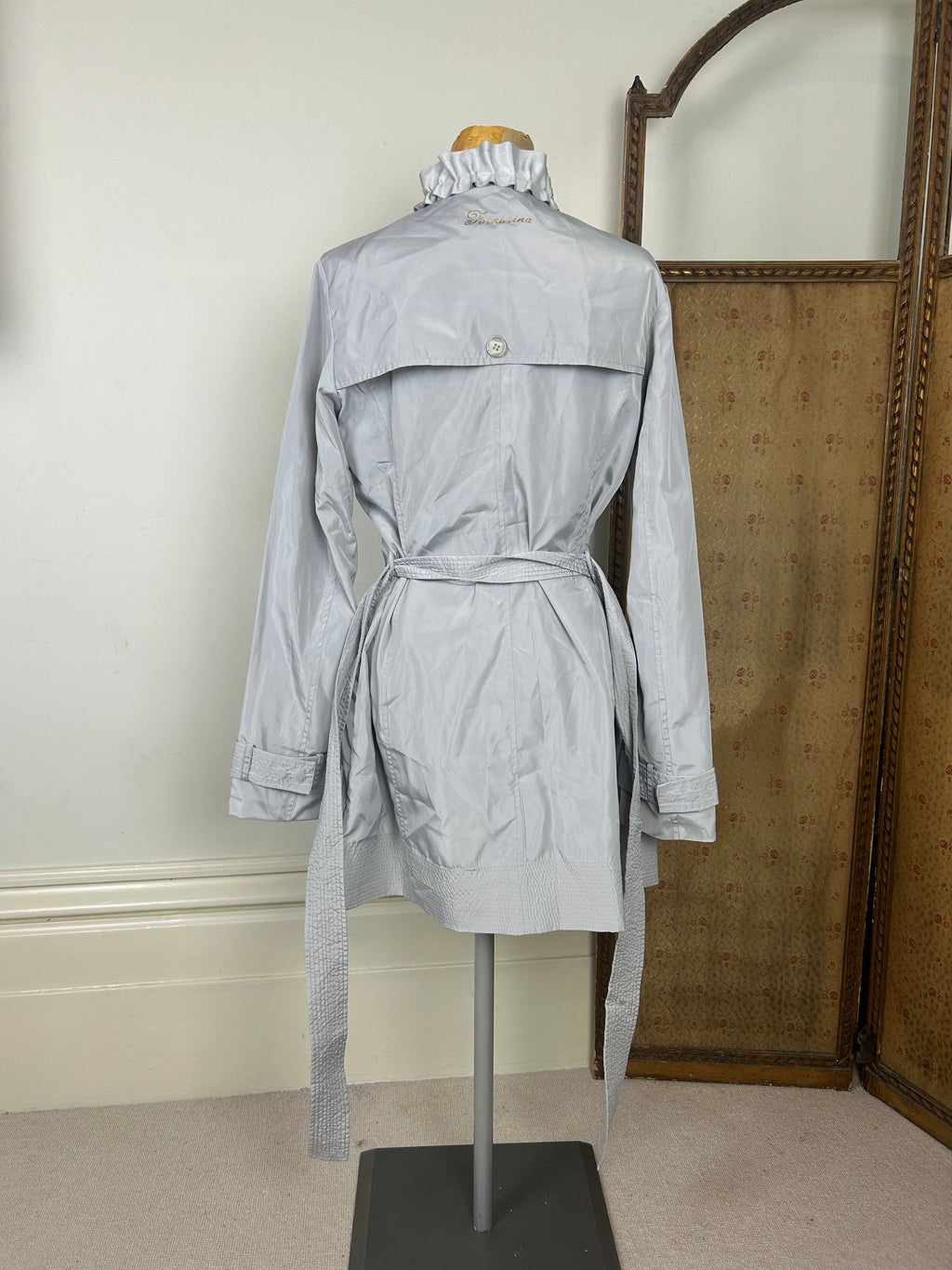 Silver ruffle trench coat
