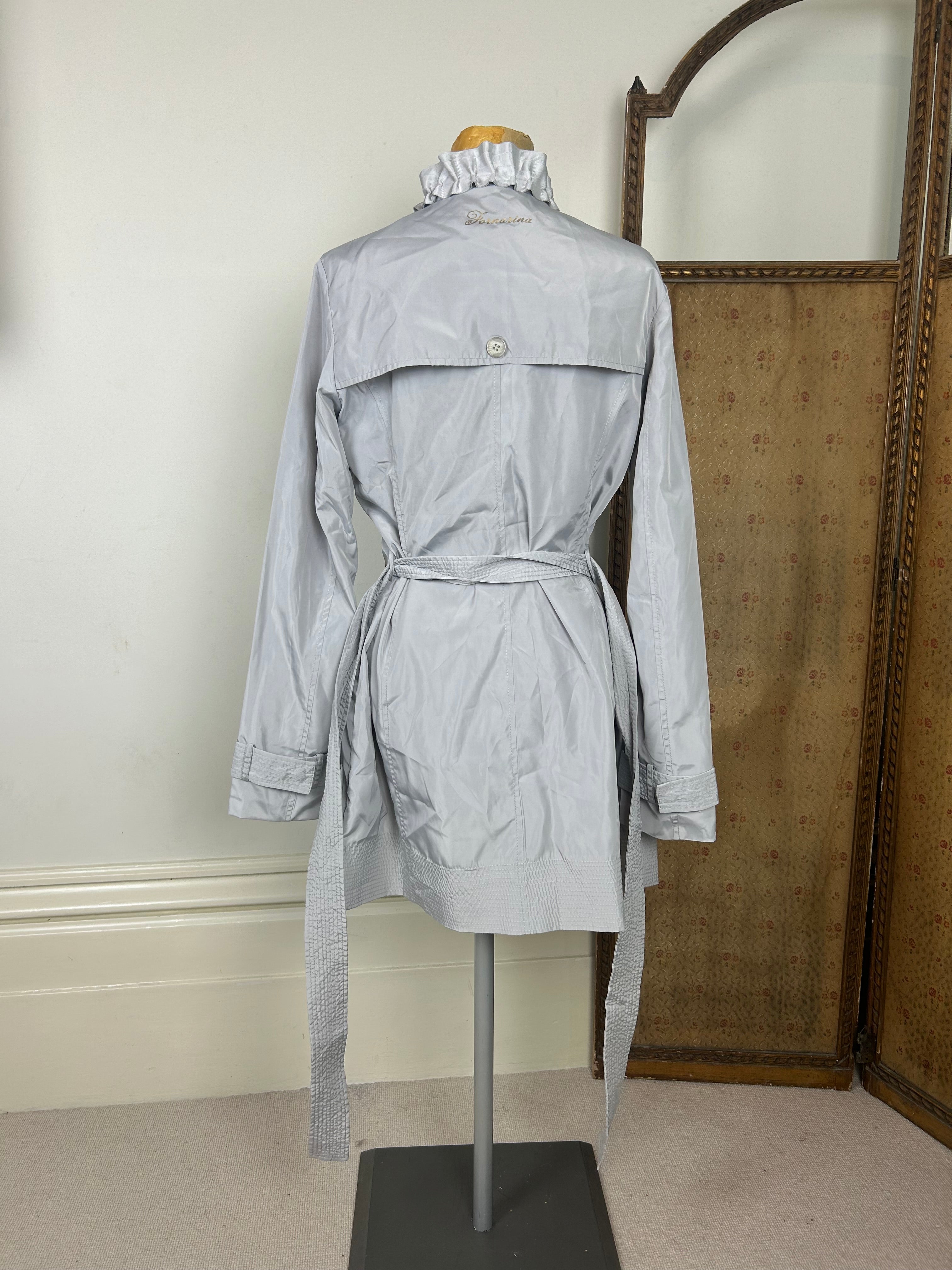 Silver ruffle trench coat