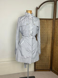 Silver ruffle trench coat