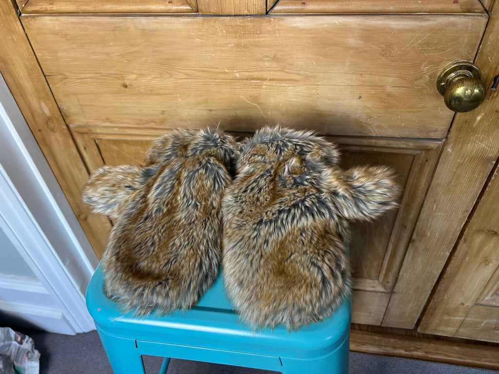 Iconic furry mittens