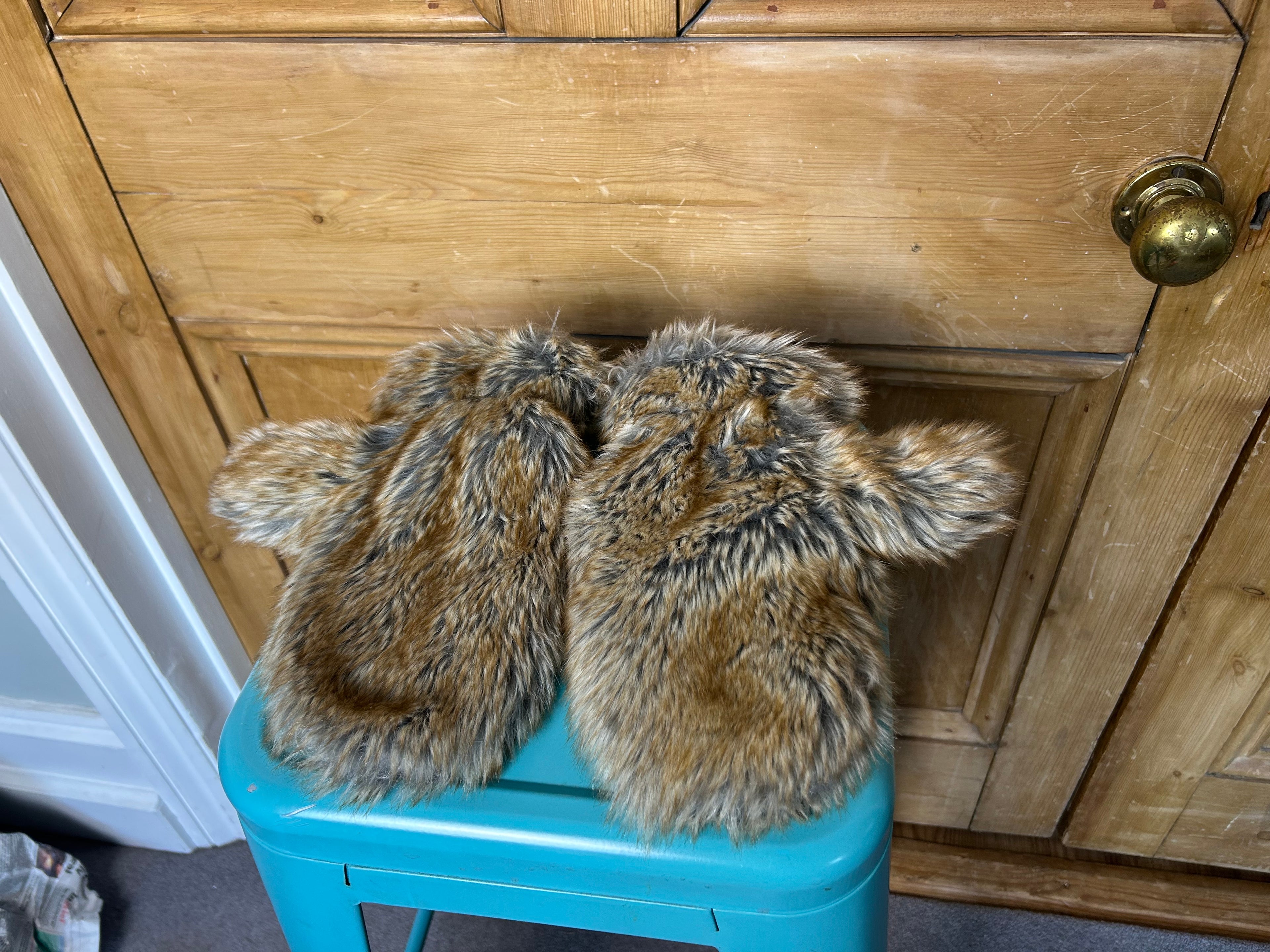 Iconic furry mittens