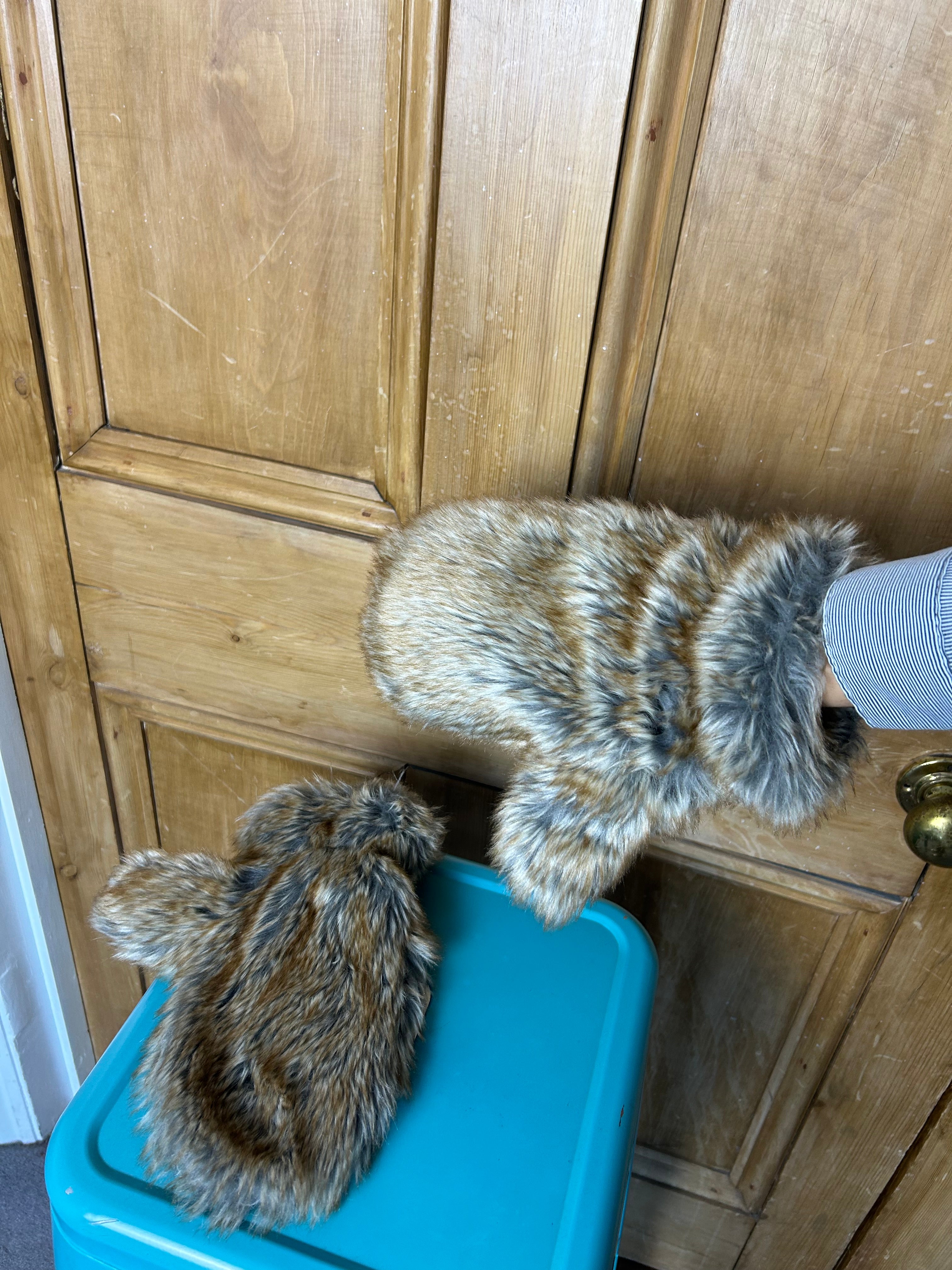 Iconic furry mittens