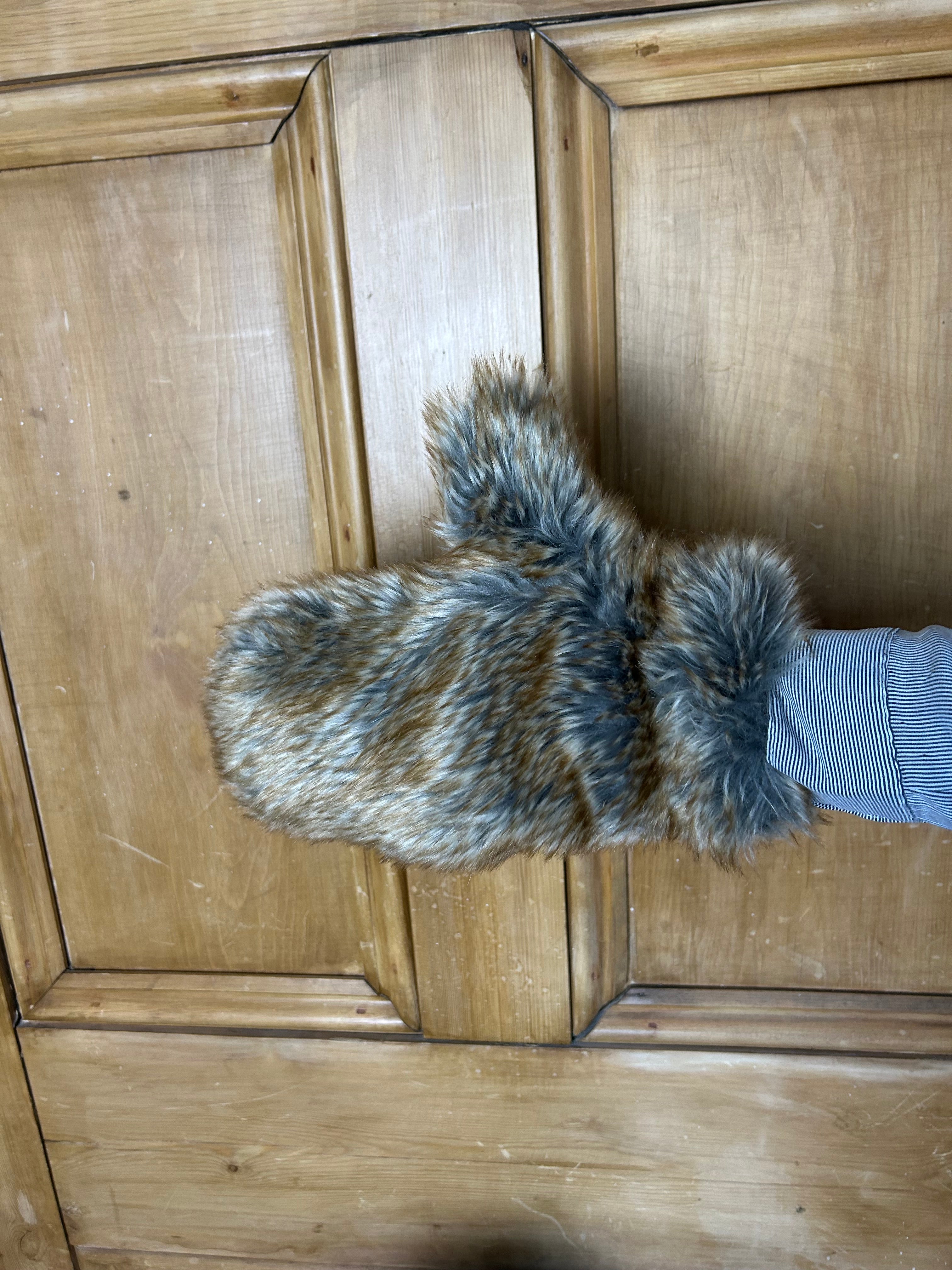 Iconic furry mittens