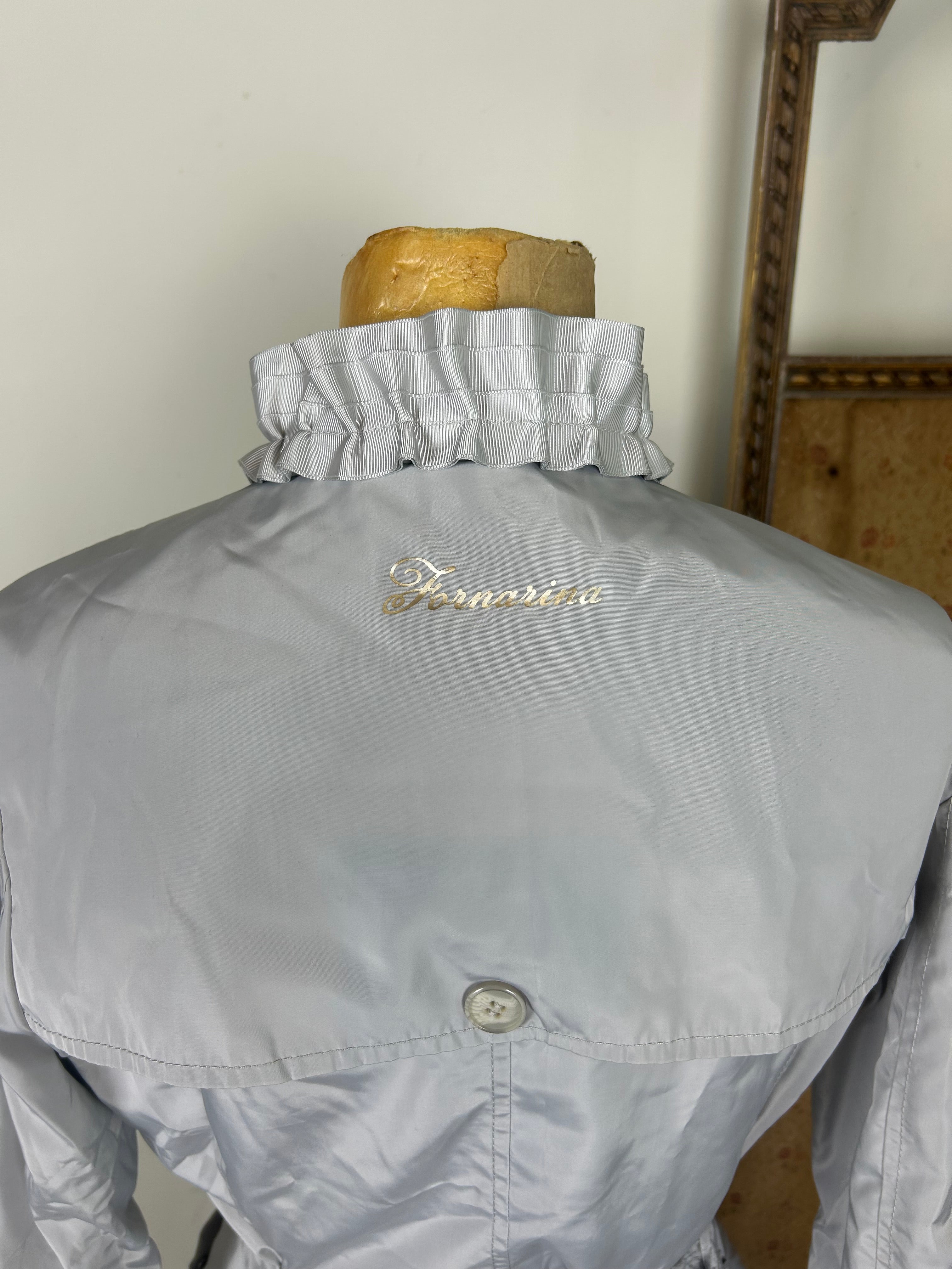 Silver ruffle trench coat