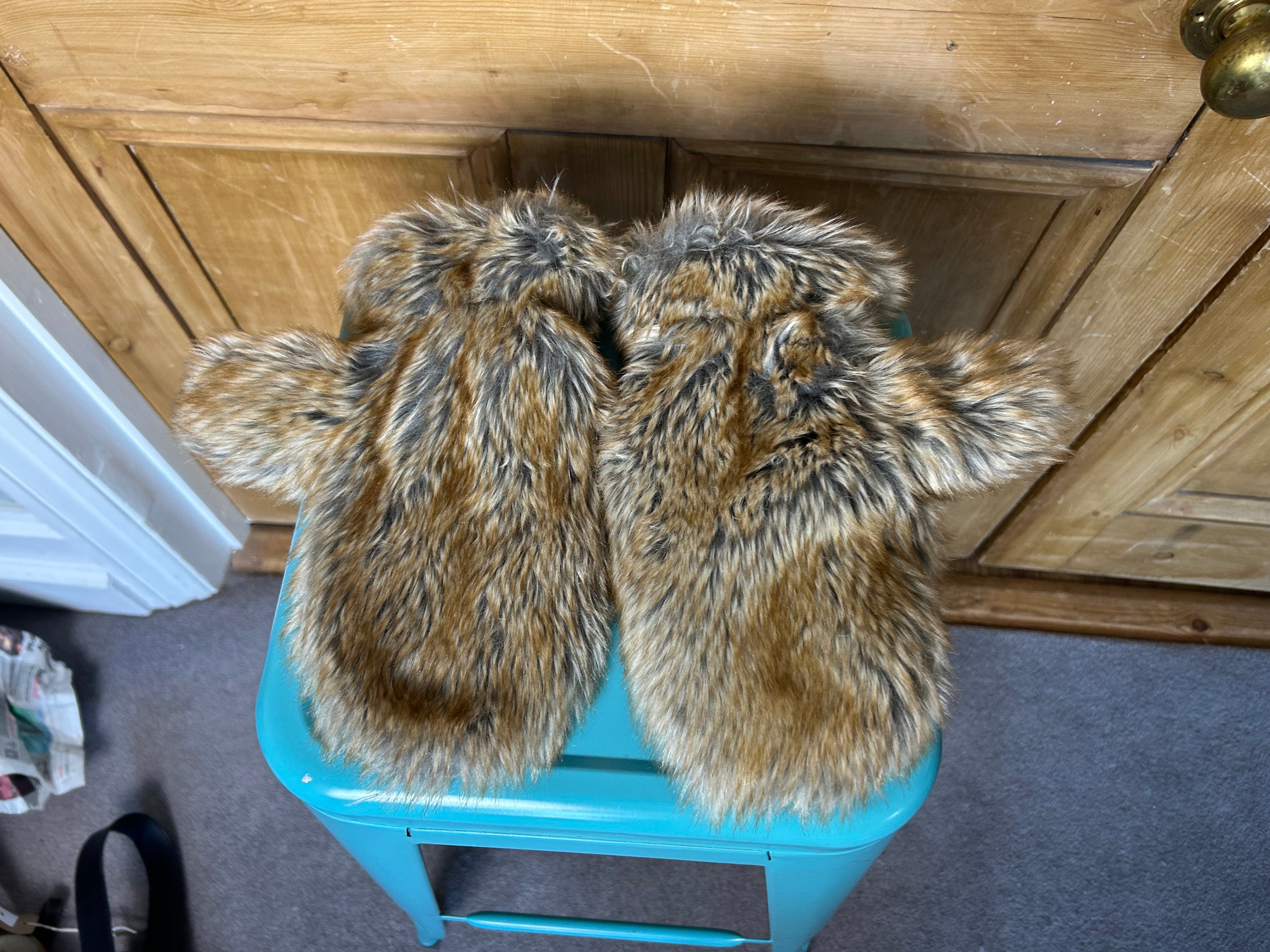 Iconic furry mittens