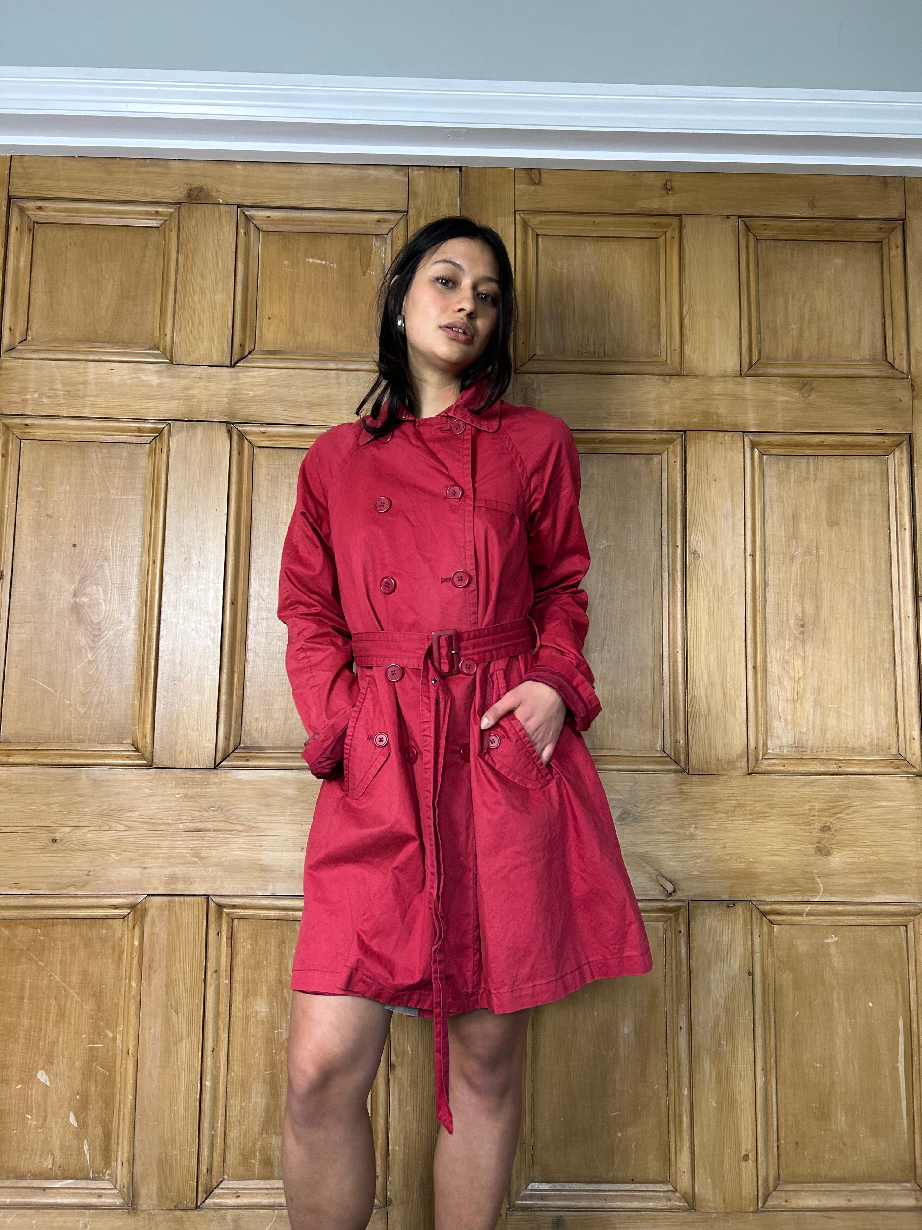 Red double breasted trench coat