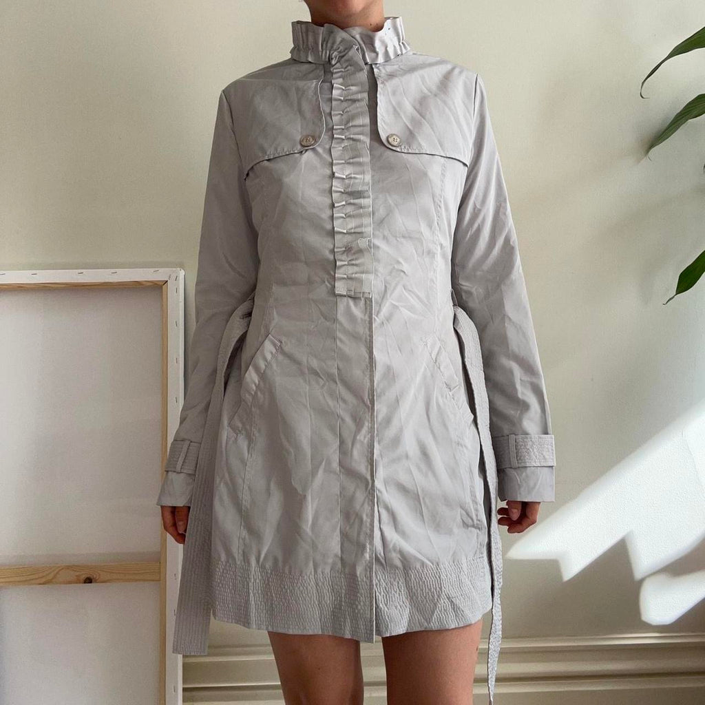 Silver ruffle trench coat