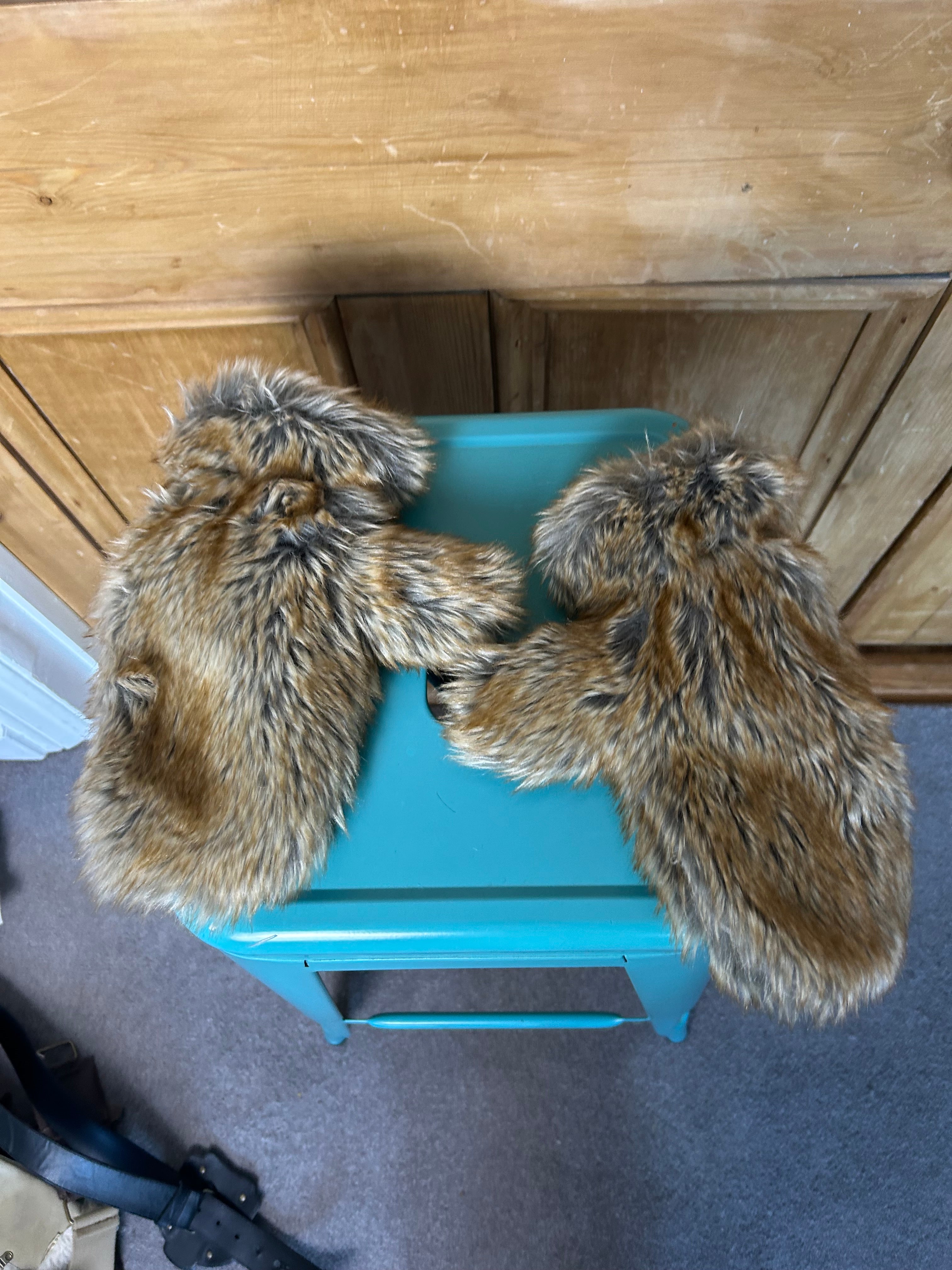Iconic furry mittens